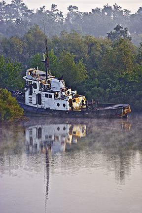 Derelict tug on Bayou Bonfouca in Slidell, Louisiana, USA